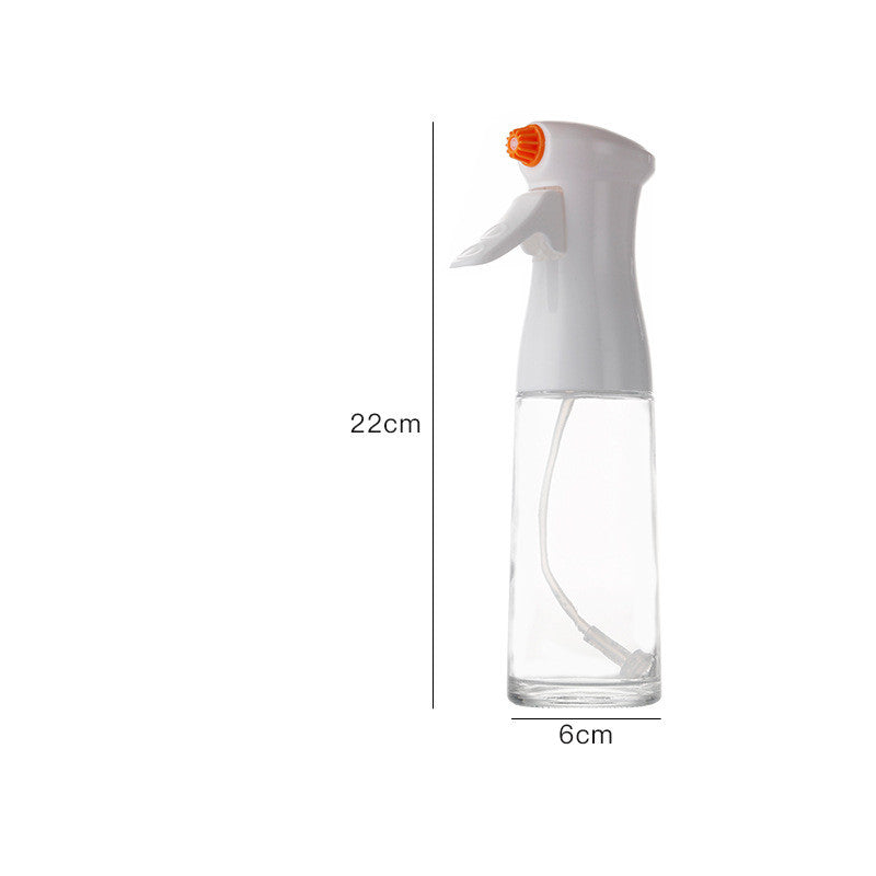 Clear spray bottle with white nozzle on a white background, showing dimensions.